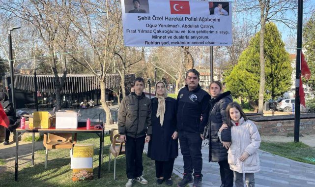 Şehitler için mevlit şekeri dağıttı