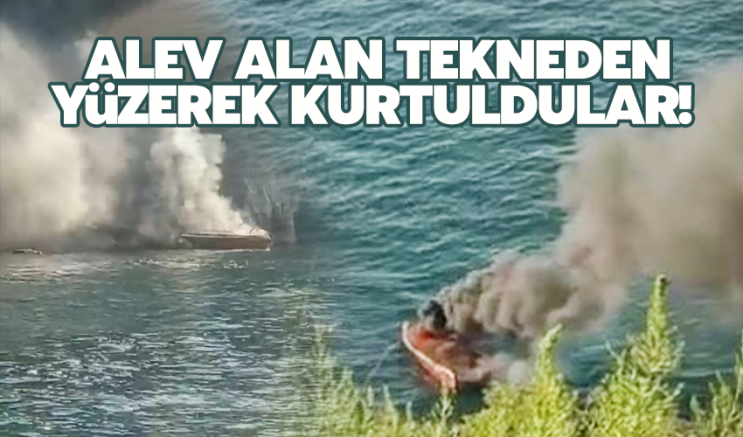 Alev alan tekneden yüzerek kurtuldular