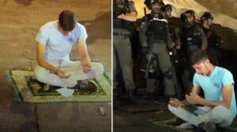 Filistinli genç, polis barikatlarının arasında seccadesine oturup bağırarak yalvardı: Allah'ım yardım et