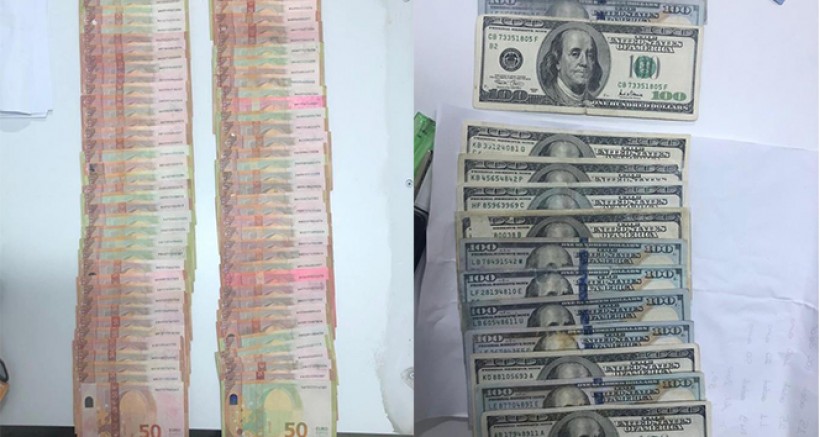 Sahte Euro ve Dolar Kullanarak Cep telefonu almaya Çalıştılar
